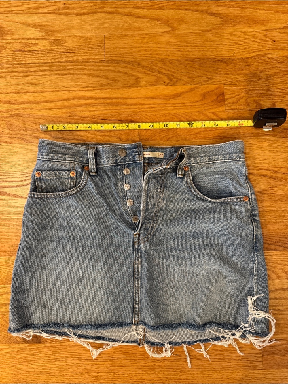 Levi's Light Blue Denim Button-Front Mini Skirt with Raw Hem